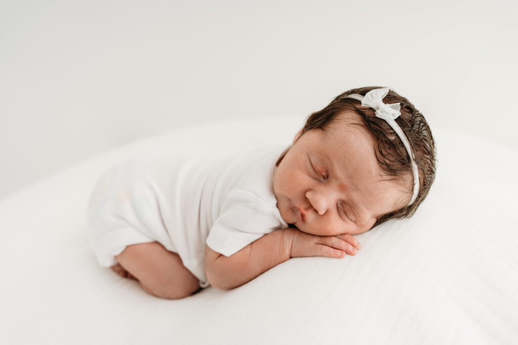 newborn baby in modern white studio southern pines NC